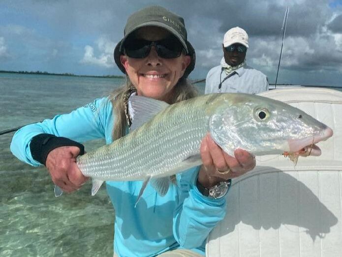 Client angler with big bonefish